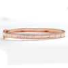 14KR 0.70CTW DIAMOND BANGLE - 9 STONE CENTER ROW