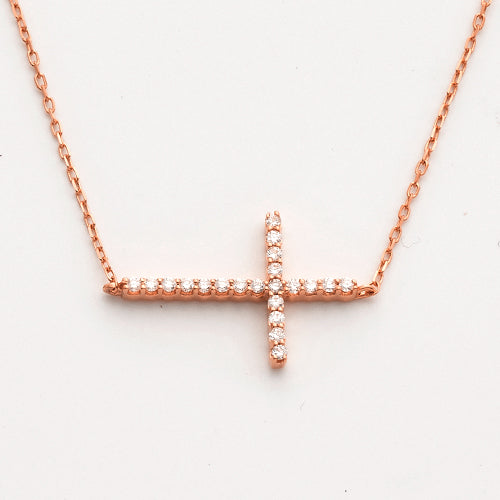 14KR 0.15CTW DIAMOND NECKLACE - SIDEWAYS CROSS