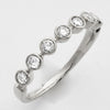 14KW 0.50CTW DIAMOND BAND - 7 STONE BEZEL SET