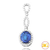 14KW 0.55CTW DIAMOND PENDANT WITH 2.52CT OVAL TANZ