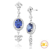 14KW 0.35CTW DIAMOND EARRINGS WITH 4.08CTW OVAL TA